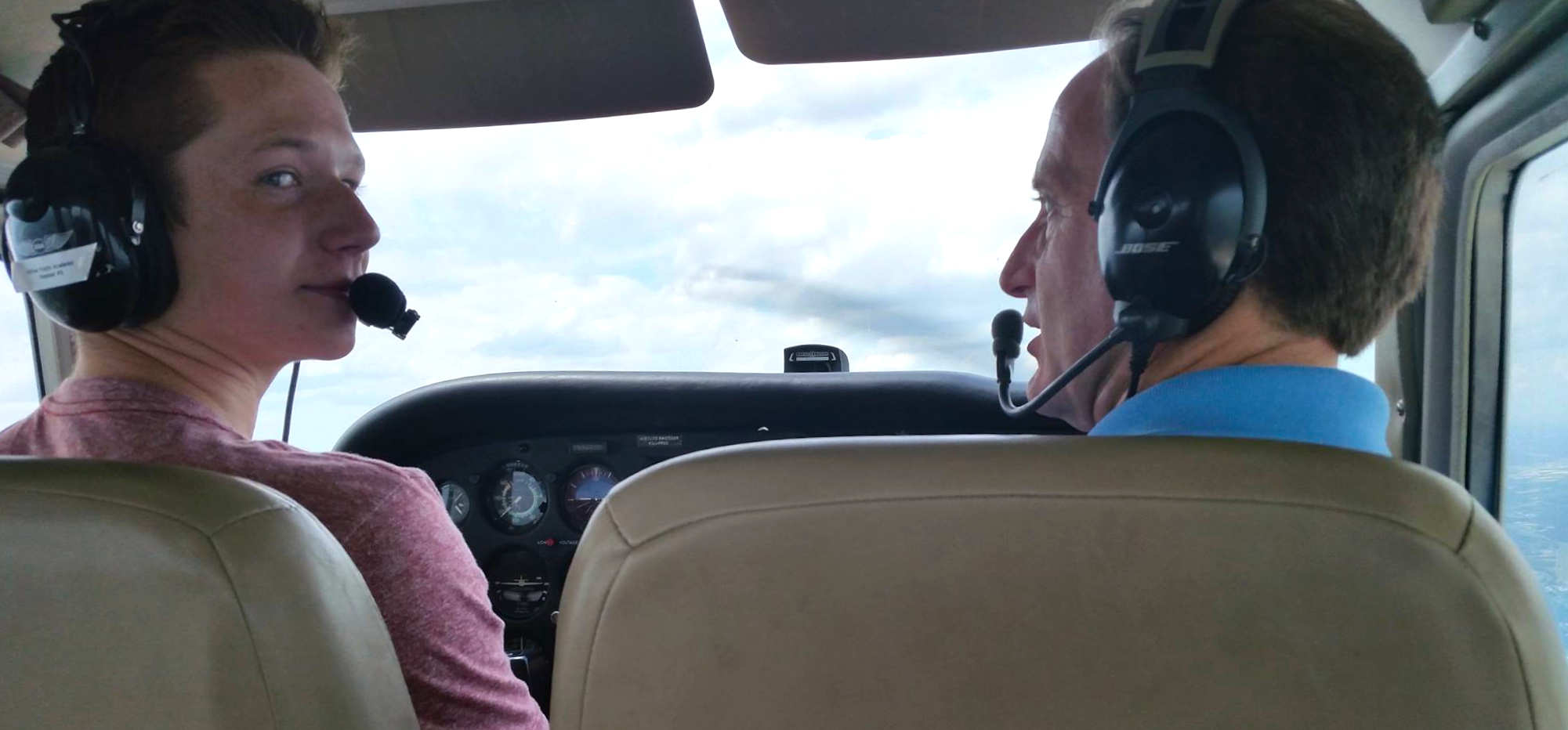 Student pilot taking notes for commercial pilot school at Alto Flight Academy in Yukon, OK